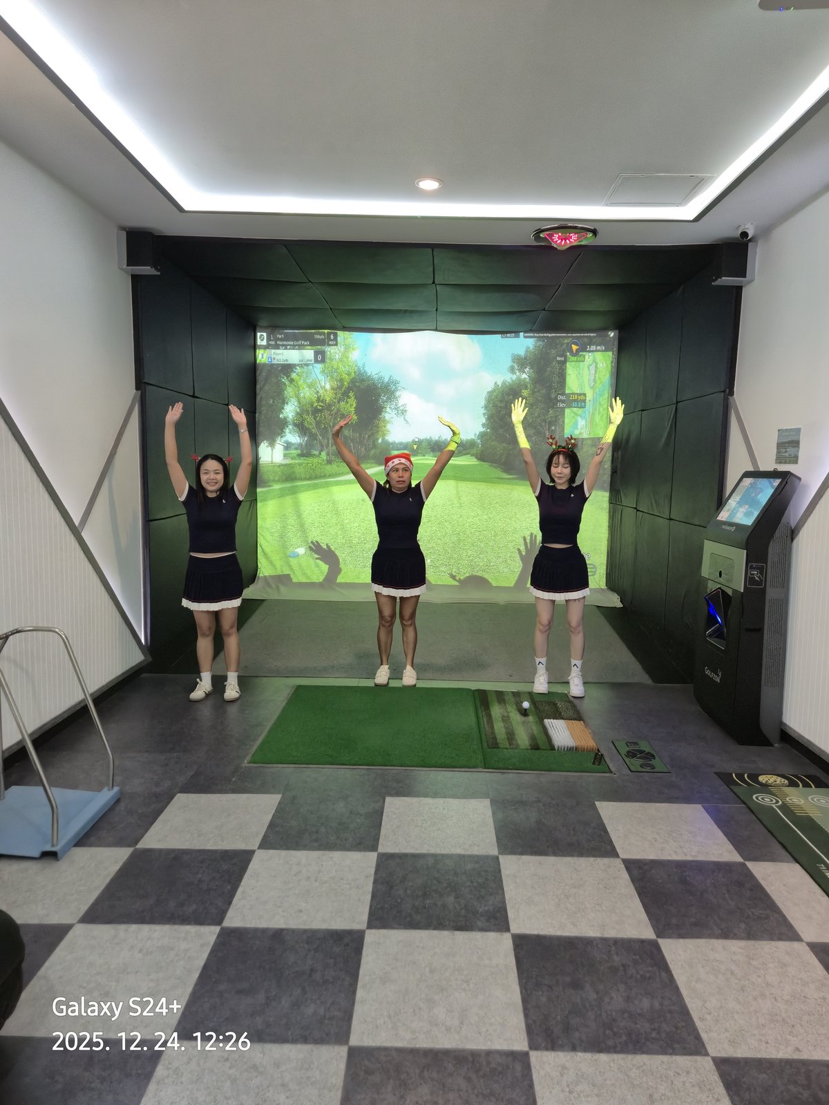 Group enjoying screen golf together